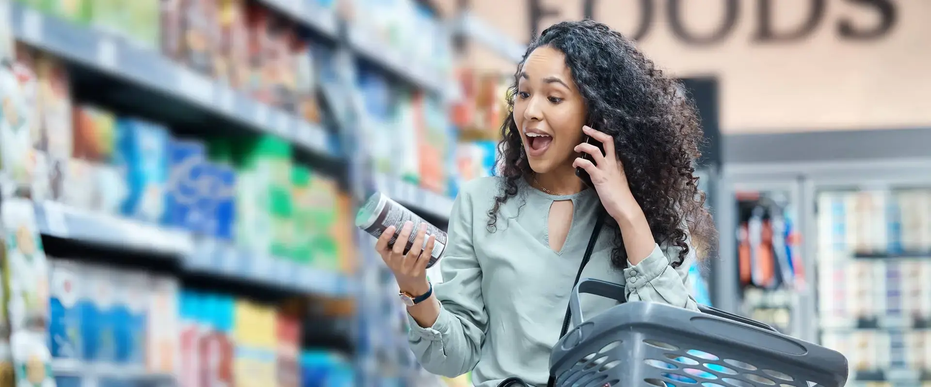 Lady looking at item while on phone