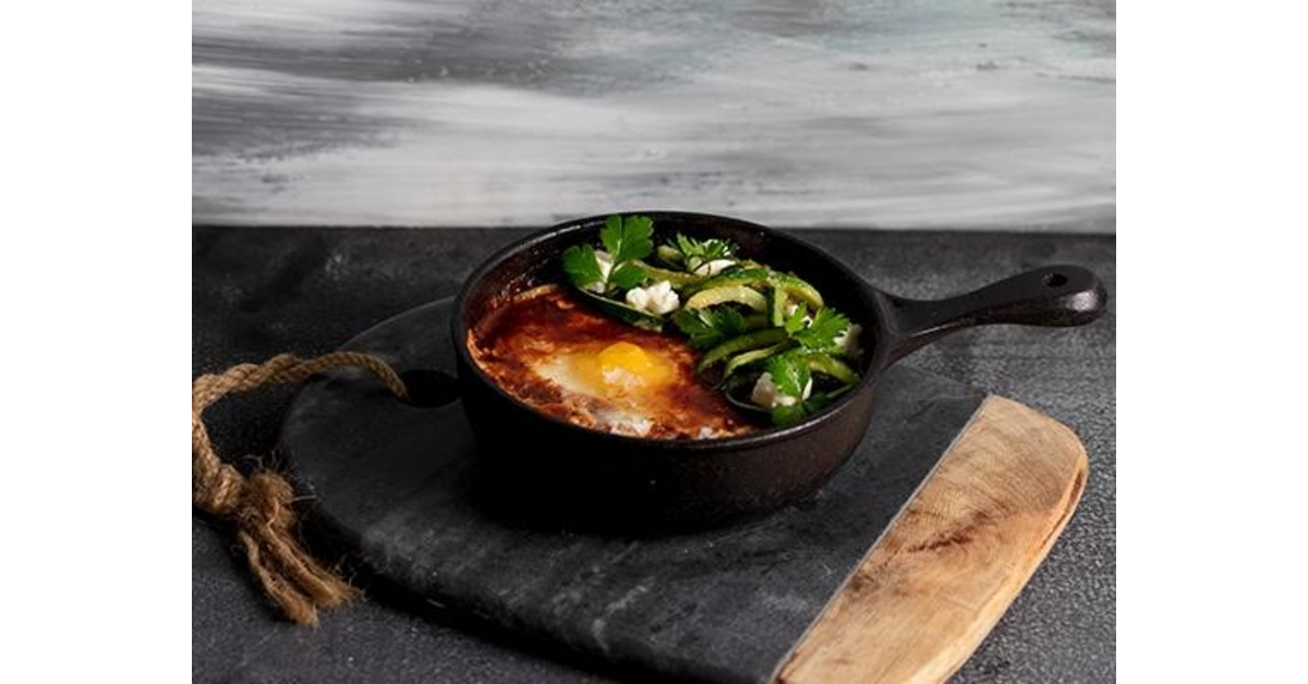 Rich Tomato Shakshuka with zucchini and feta