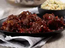 MAGGI Meatballs Braised in Slow Cooked Red Pepper Gravy with Cheesy MAGGI Mash and Fresh Coriander