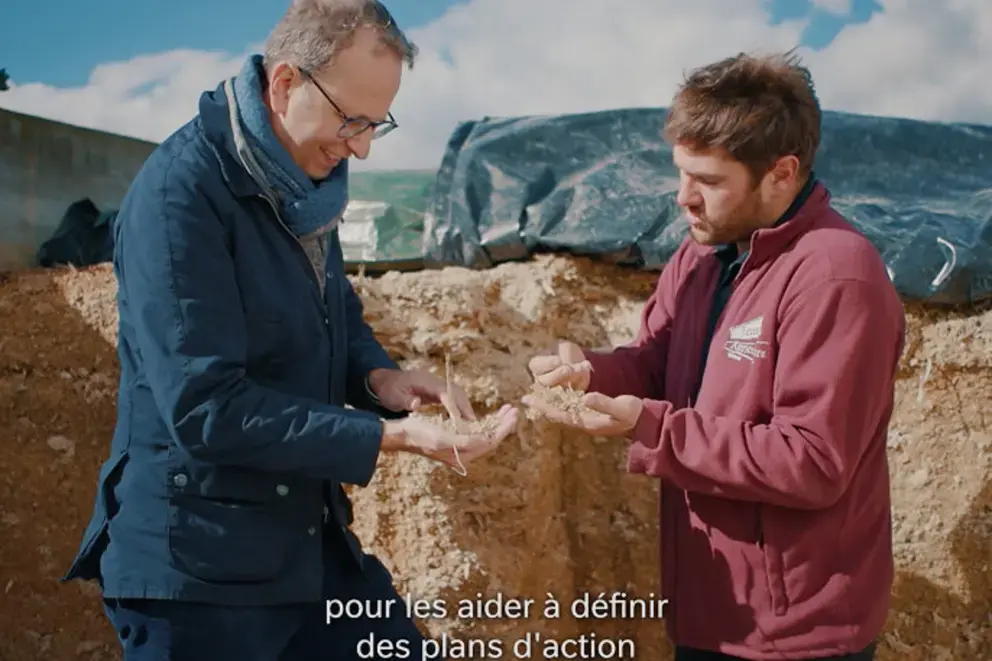 Two men talking in the nature.