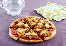Pizza aux artichauts et tomates confites
