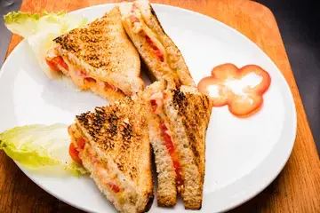 Melted Cheese and Refried Bean Sandwiches