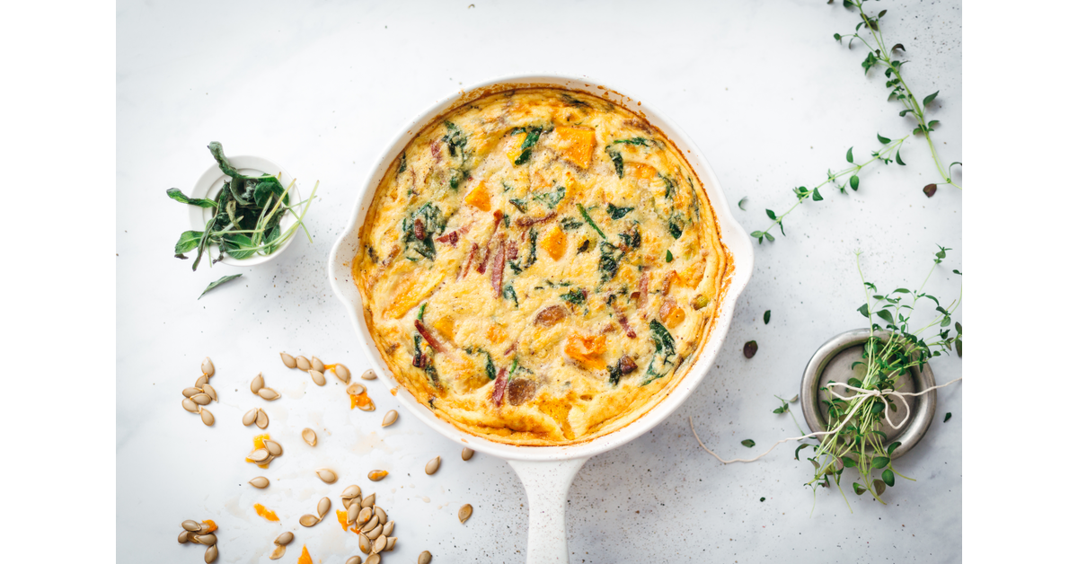 Spinach baked eggs with parmesan & tomato toasts